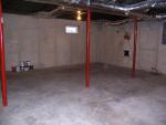 Large walkout basement, ready to finish. Rough in for a bath and a FP or woodburning stove-flue already installed.  